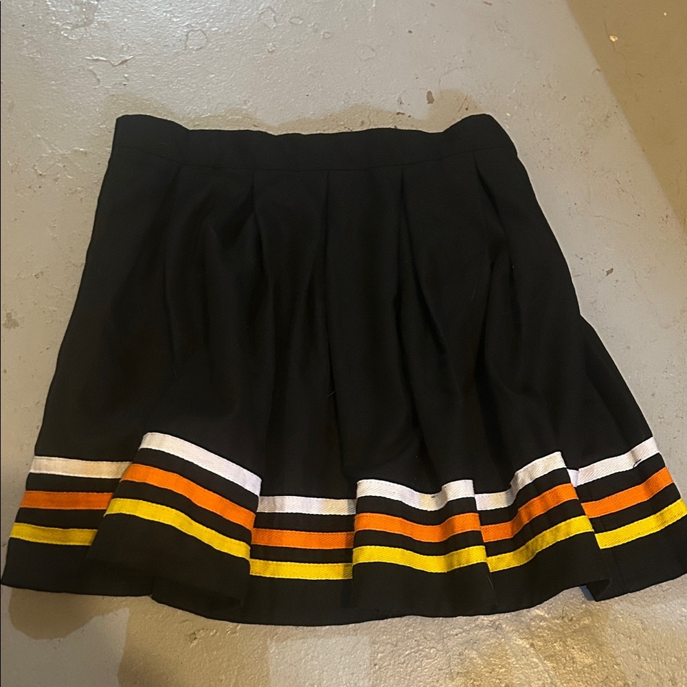 Black Pleated Skirt with Striped Hem